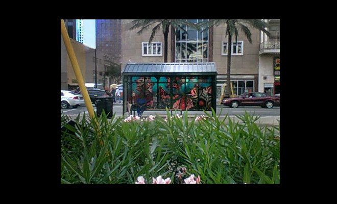 public art image: The TransArt Public Art Commission / BIG Wish, 2008, digital image decal on street car shelter (corner Carondelet and   Canal Streets), Downtown Development District, New Orleans, LA, and link to: public art: New Orleans Downtown Developement District Streetcar Shelter Project3